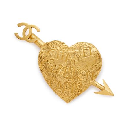 chanel arrow brooch